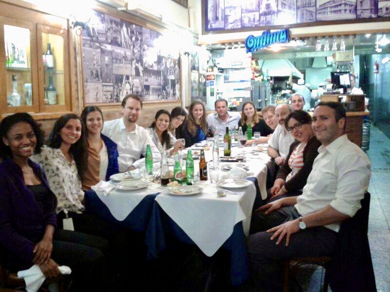 Keith with actuarial colleagues at a parrilla in Argentina